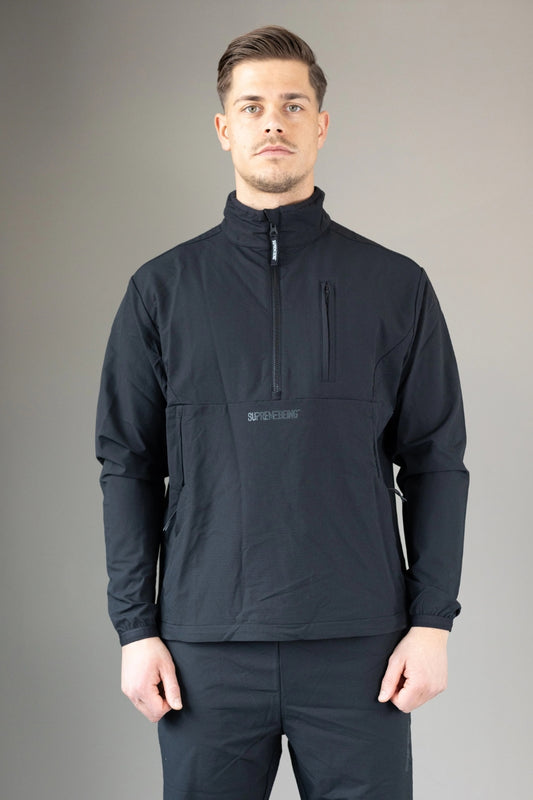Streetwear active half zip in black with tonal branding and seam detailing